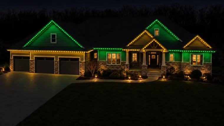 The same home with the roofline running green and gold